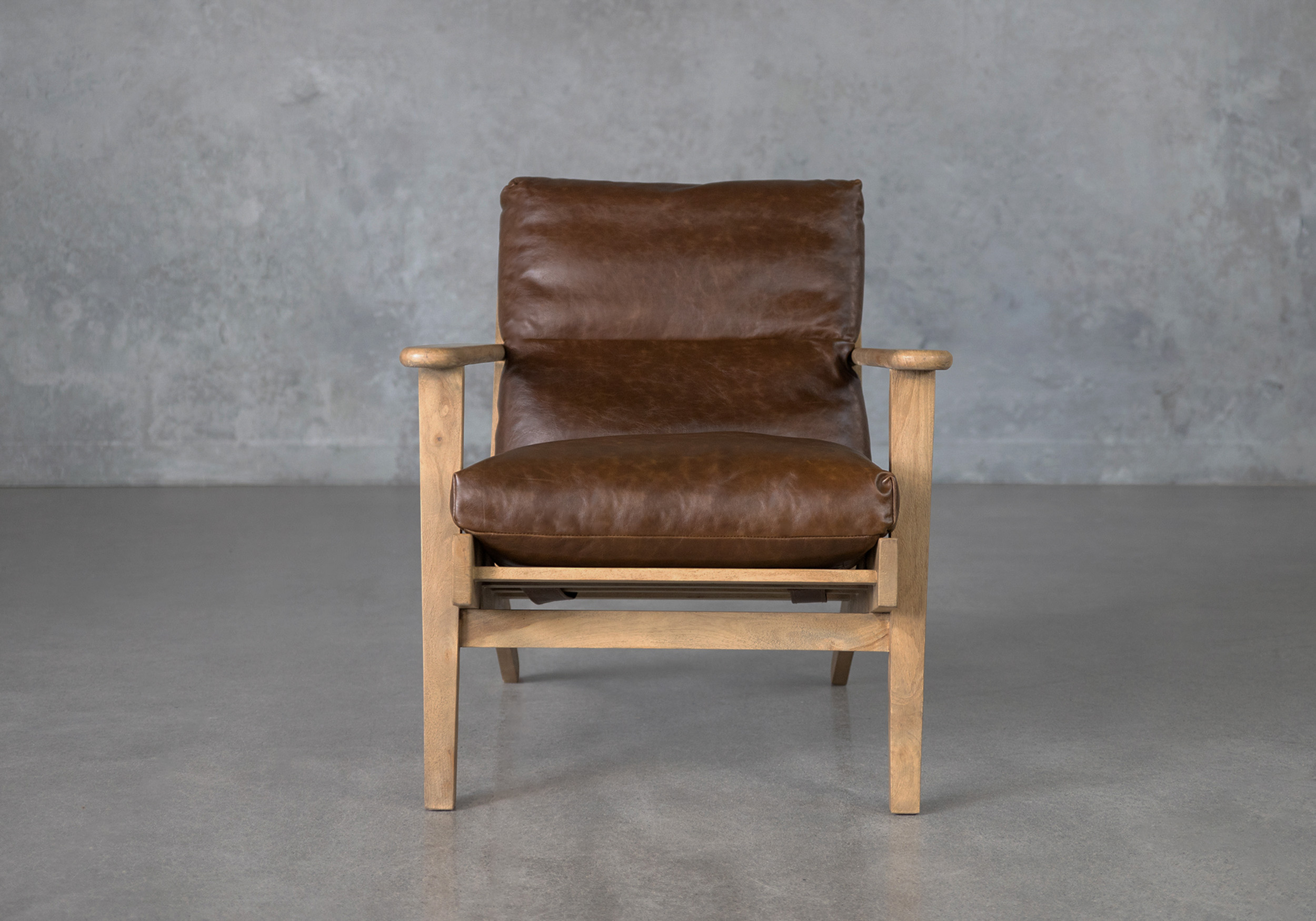 ronan brown leather accent chair front