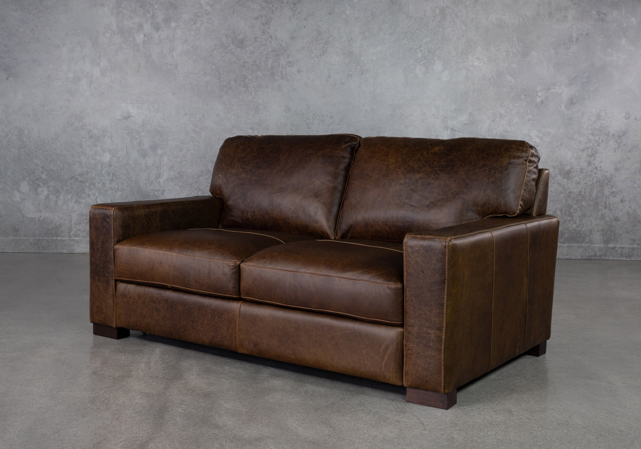 Giovanni Leather Loveseat Angle