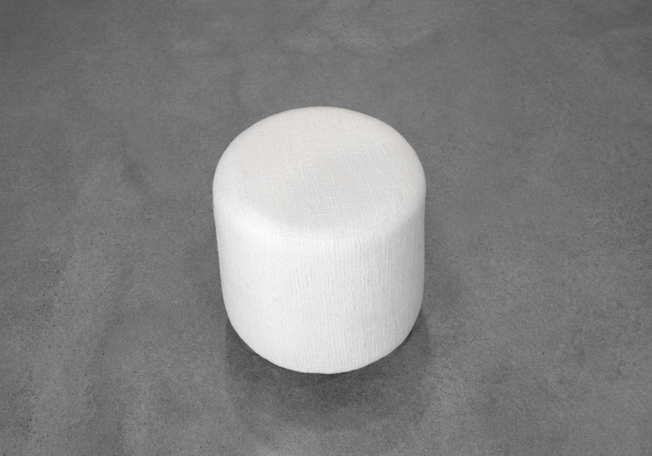 Bow Ottoman in Ivory