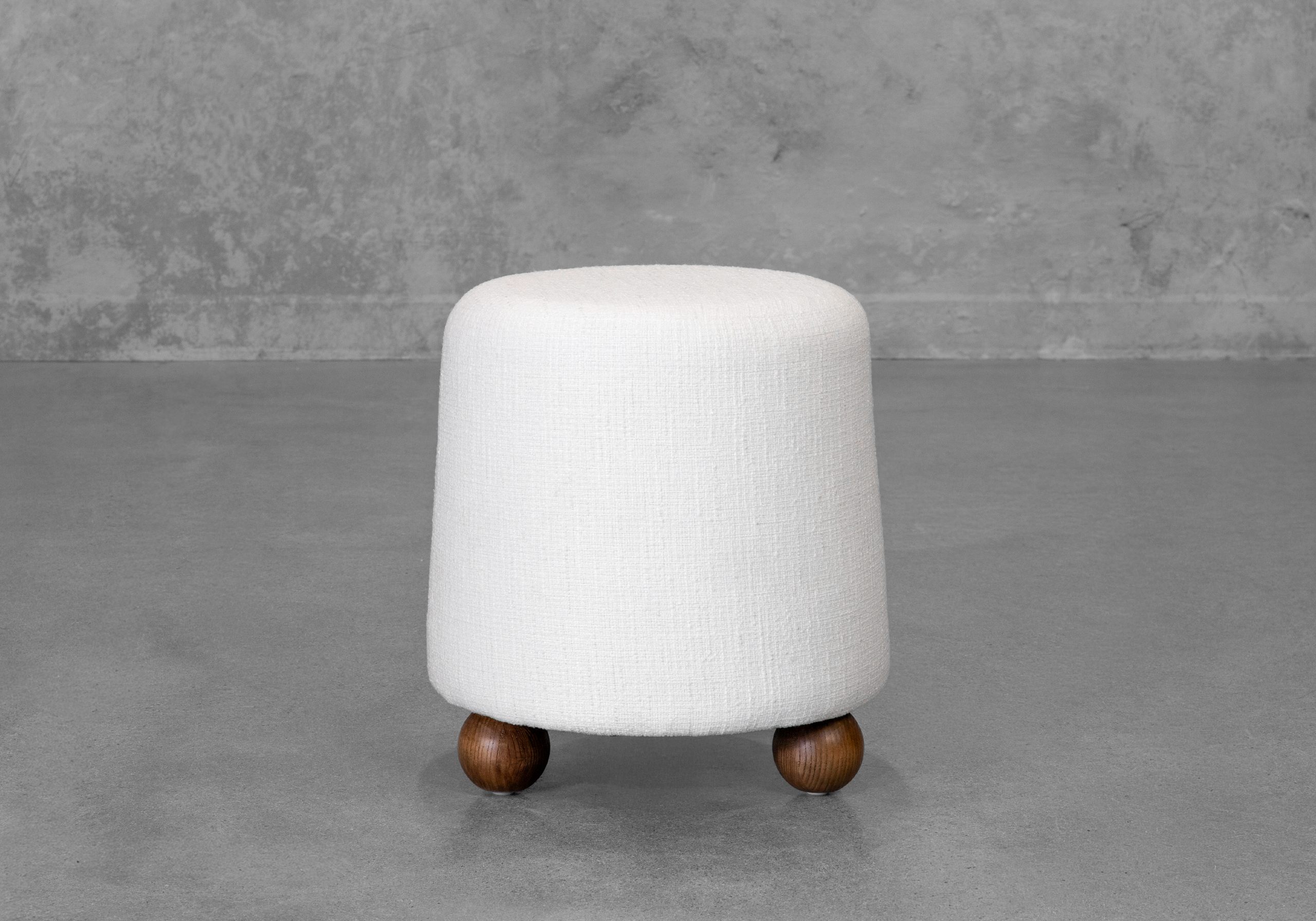 Bow Ottoman in Ivory - Front