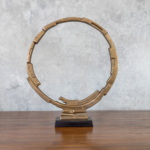Brass Ring Sculpture on Black Stand